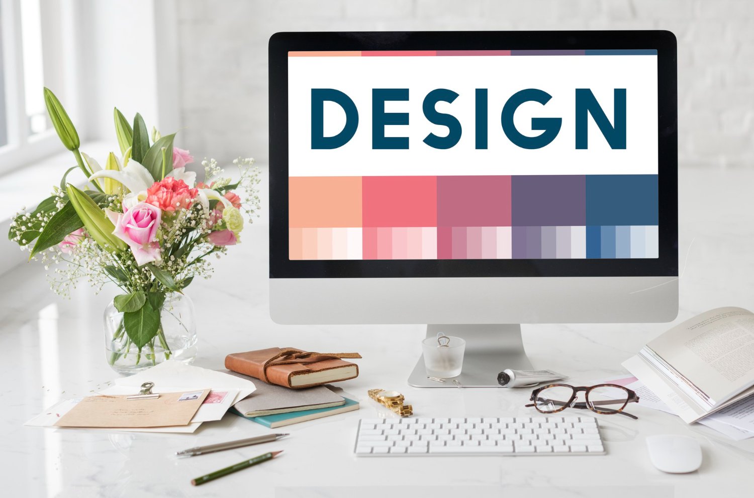 Creative design workspace with ideas, notes, and laptop representing logo design services in Lahore, branding, graphic design, and creative thinking concept