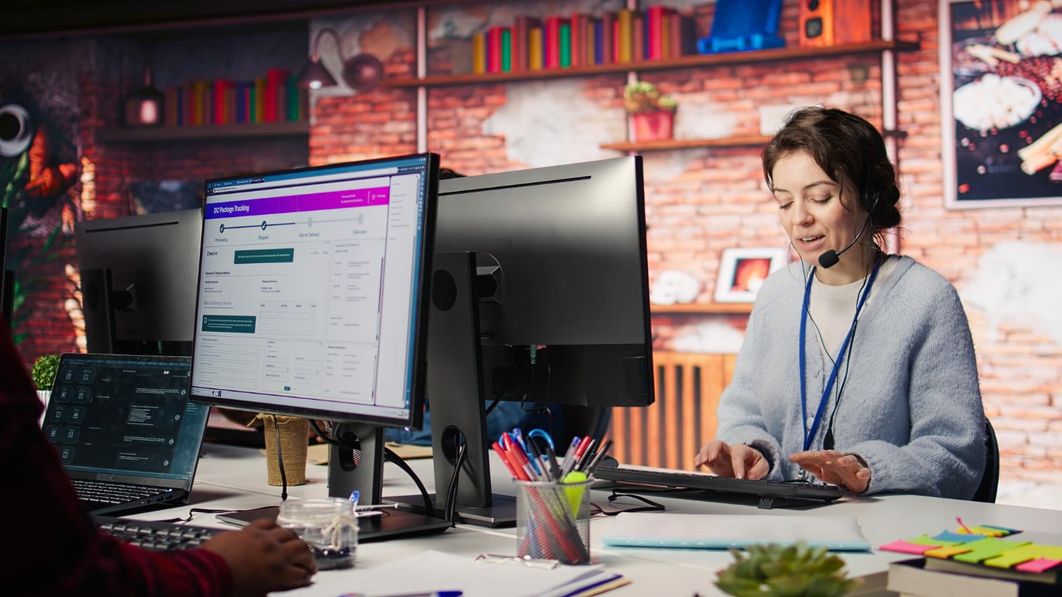 Team of call center agents tracking shipments and solving tasks, representing professional WordPress development services, web support and custom WordPress solutions in Lahore Pakistan